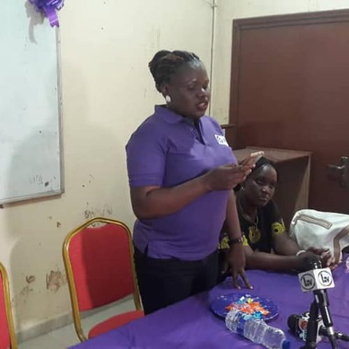 A BBSI team member speaking at an advocacy and awareness event