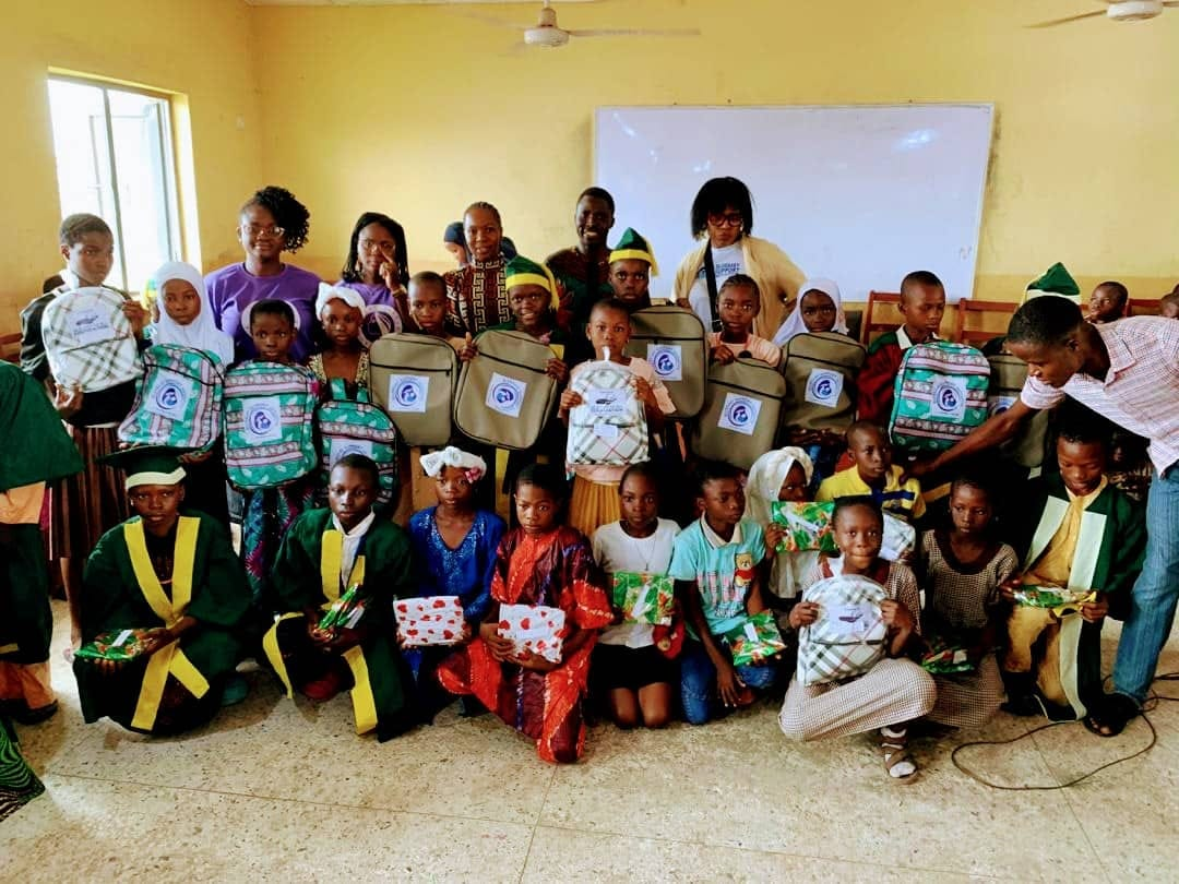 Students of Methodist Basic School with their new backpacks